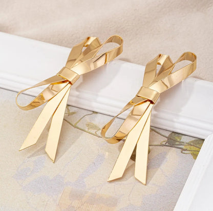 Golden Bow-Tique - 14K Gold Plated Elegance with a Playful Twist