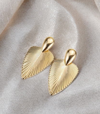 Drop Leaf Earrings – Stainless Steel Korean Design - Add a touch of nature-inspired elegance with our Drop Leaf Earrings, crafted in durable stainless steel for a sleek, modern finish. Perfect for everyday wear or to elevate your evening look.
