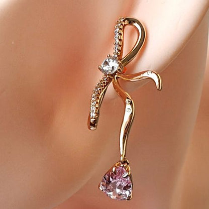 Blush Bow Dangling Stud Earrings – Stainless Steel Elegance - Delicately crafted in stainless steel, these blush pink stone bow earrings add a graceful touch of charm to any look.