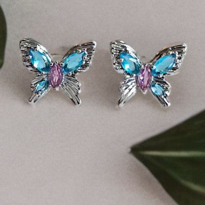 Azure Wing Butterfly Stud Earrings – Delicately fluttering with sparkling stones, bring a fresh, dreamy touch that makes you feel light and radiant.