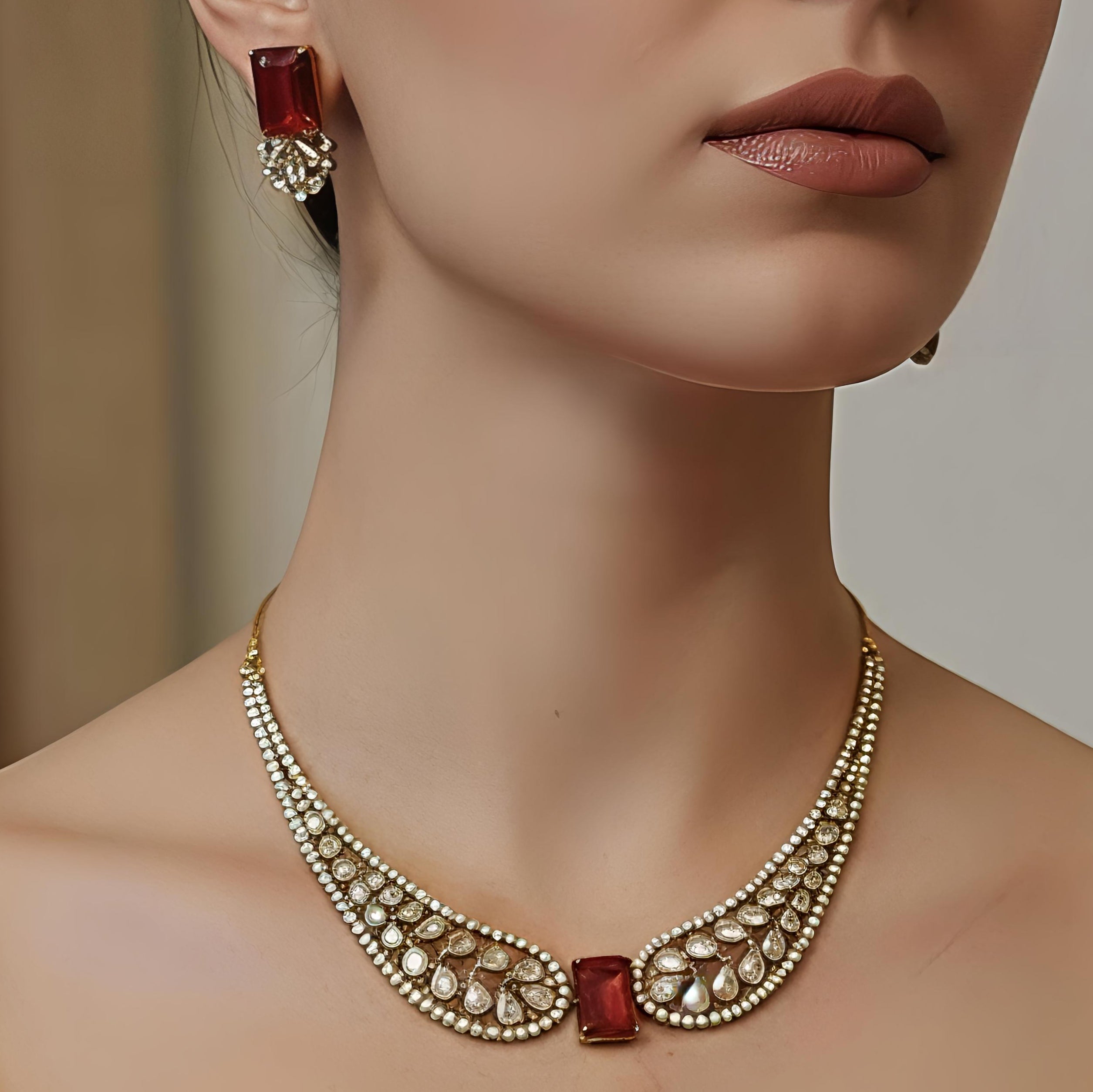 Red Stone Wing Statement Necklace Set with AD Stones in Golden Polish for Women