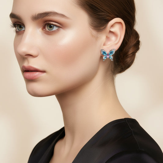 Azure Wing Butterfly Stud Earrings – Delicately fluttering with sparkling stones, bring a fresh, dreamy touch that makes you feel light and radiant.