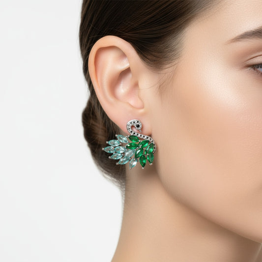 Emerald Grace Swan Stud Earrings - Like a gentle whisper of nature, these green swan studs grace your ears with elegance and serene beauty.