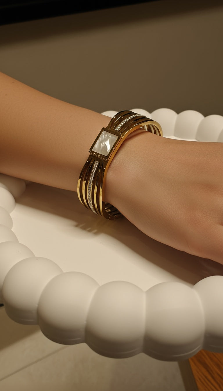 The Stylus One: White-Stone Cassee Frame Gold Pleated Stainless Steel Bracelet