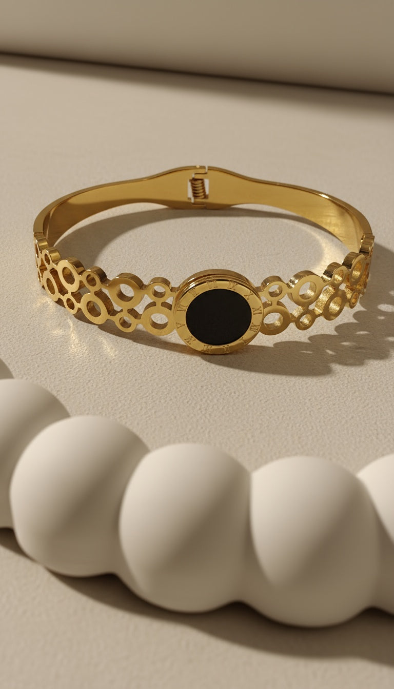 The Nutty One -  Black-Centered Gold Pleated Stainless Steel Bracelet