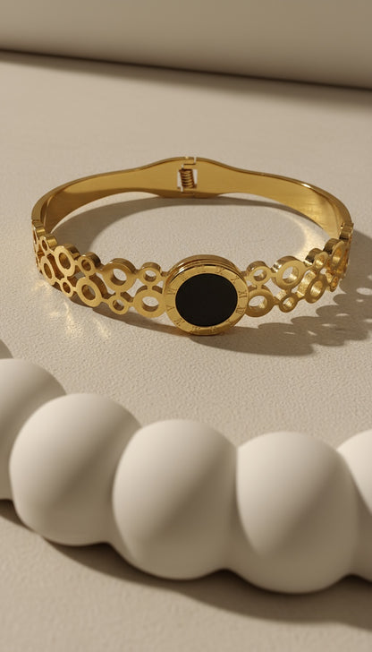 The Nutty One -  Black-Centered Gold Pleated Stainless Steel Bracelet