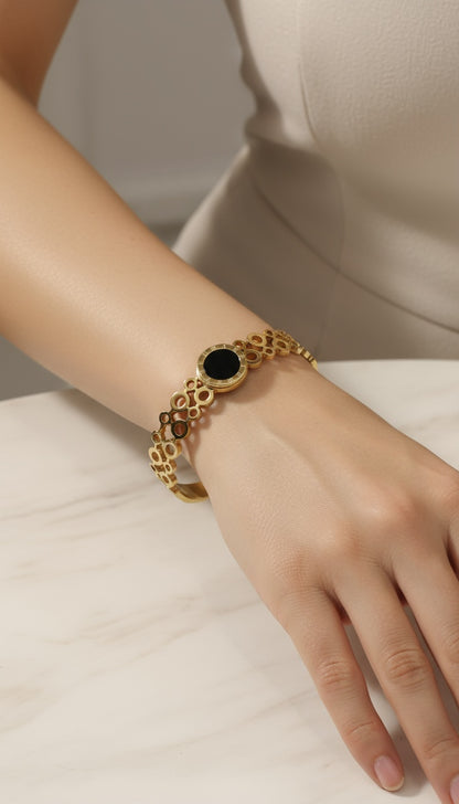 Inspired Gold-Plated Stainless-Steel Bangle – The Essence of Elegance