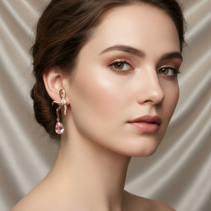 Blush Bow Dangling Stud Earrings – Stainless Steel Elegance - Delicately crafted in stainless steel, these blush pink stone bow earrings add a graceful touch of charm to any look.